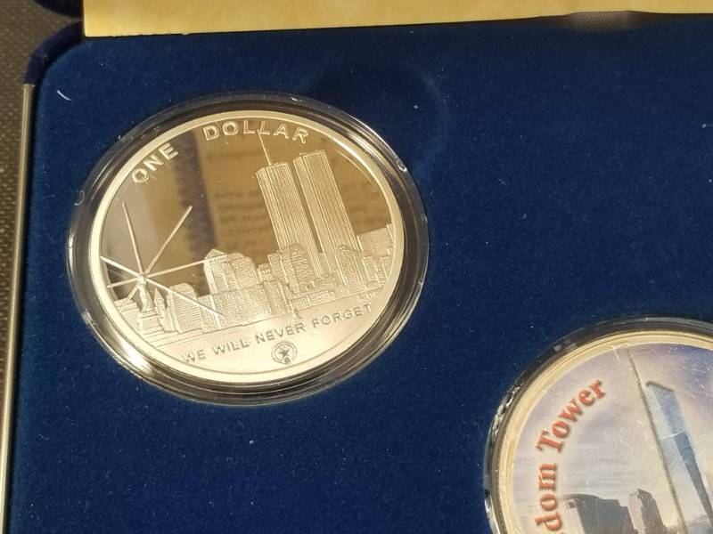 lot 05-A image: SEPTEMBER 11th 3 COIN BOX SET STRUCK WITH SILVER RECOVERED FROM GROUND ZERO