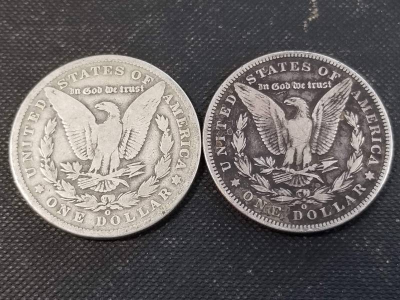 lot 26-A image: 2 MORGAN SILVER DOLLARS 1889-O 1899-O
