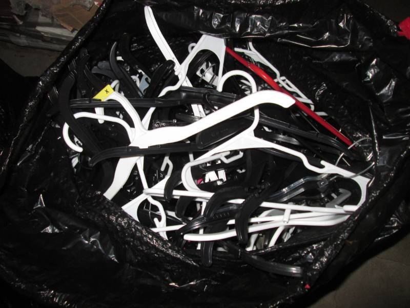 lot 10 image: Large Bag Full of Assorted Hangers...