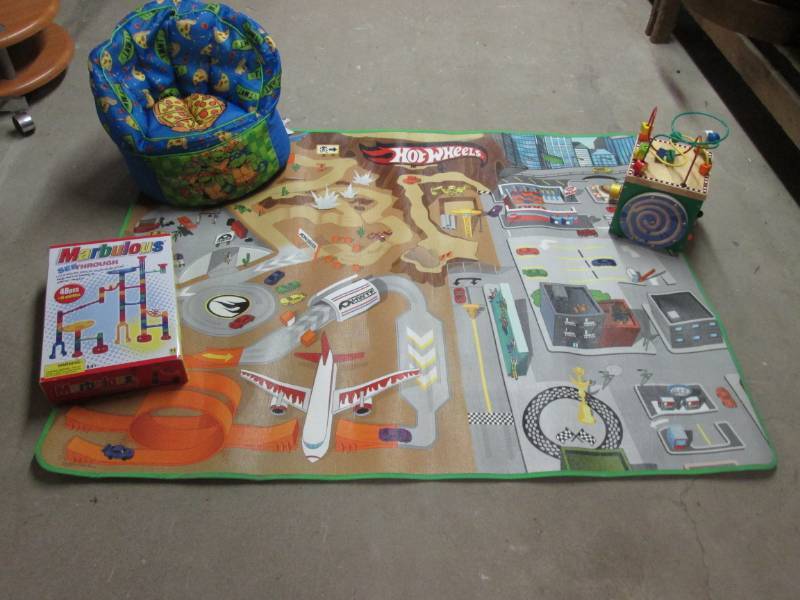 lot 87 image: 4 ft x 5 ft Hot Wheels Play Rug, Ni...