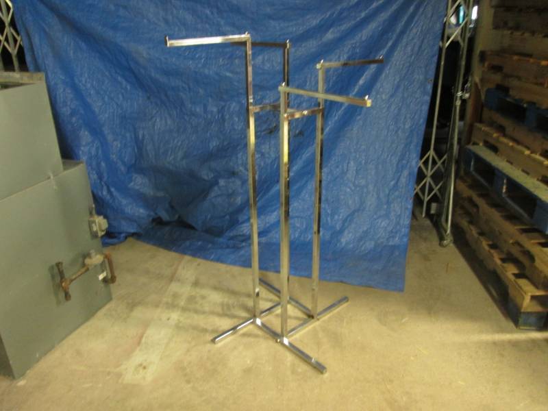 lot 95 image: 4 Arm Adjustable Clothes Rack Displ...