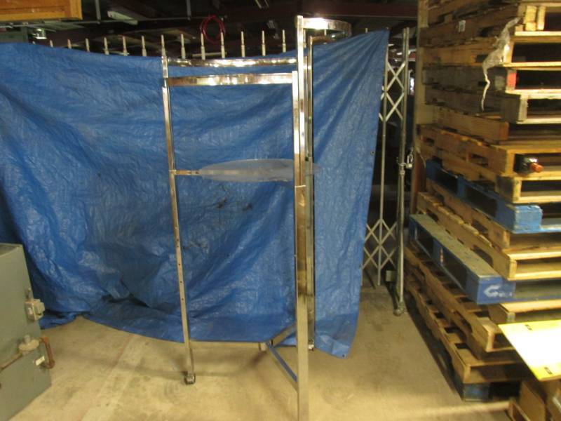 lot 101 image: Round 3 Sided Adjustable Clothes Ra...