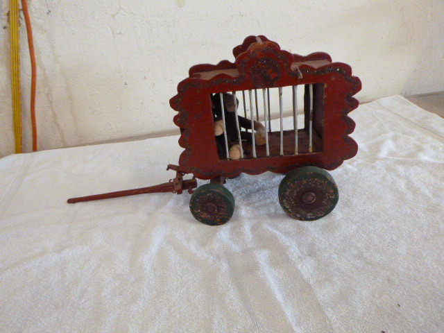 lot 10 image: Folk Art - Handmade Circus Car with Stuffed Monkey