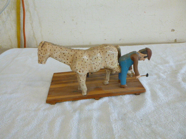 lot 11 image: Folk Art - Handmade Horse and Ferrier