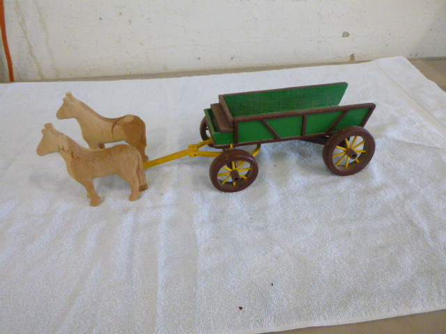 lot 12 image: Folk Art - Handmade Horses Pulling Cart