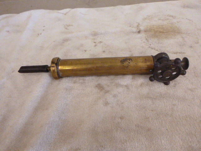 lot 18 image: Antique Kellogg Mfg. Co. Grease Gun