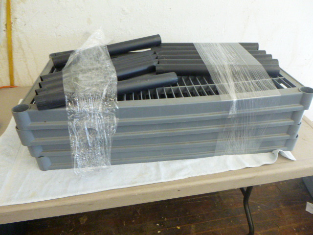 lot 77 image: 4 Tier Plastic Shelving