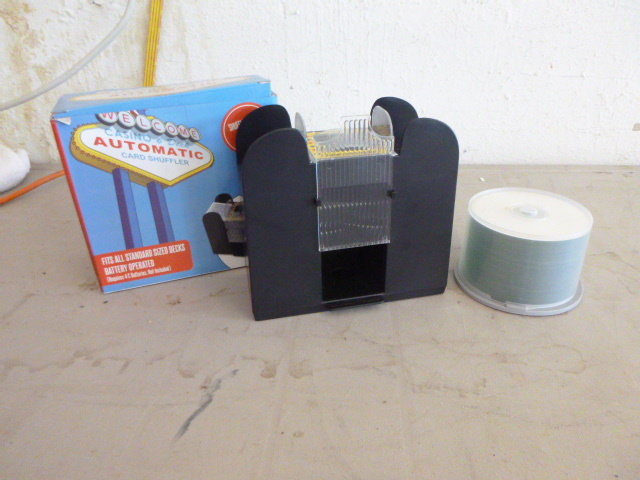 lot 87 image: Bry Belly Automatic Card Shuffler and Blank CDs