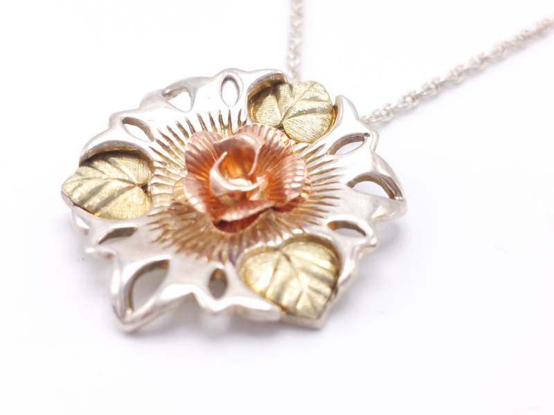 lot 59 image: 12k Gold and Sterling Silver Estate Necklace