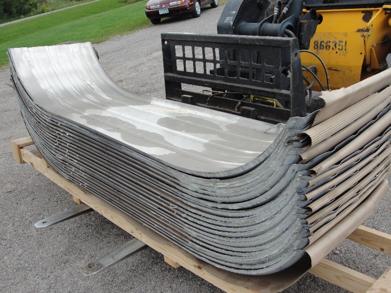lot 42 image: 2 - 16 GA. x 25 x 94 RIB UP  STAINLESS STEEL FENDERS