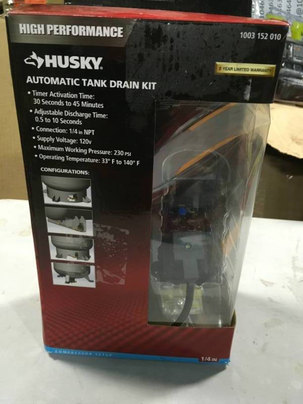 lot 6 image: Husky Automatic Electronic Tank Drain in good condition