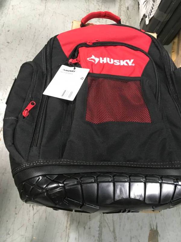 lot 23 image: Husky 18 in. Rubber Bottom Tool Backpack in Red not used