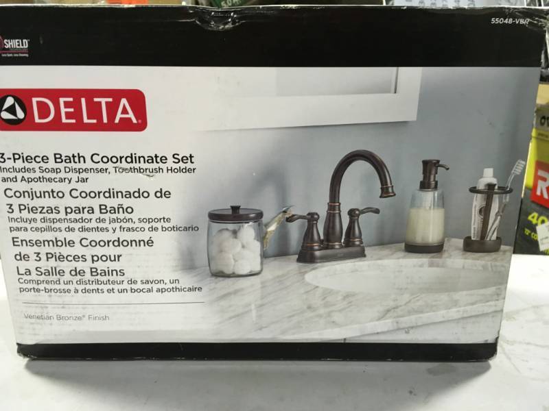 lot 35 image: Delta 3-Piece Bathroom Countertop Accessory Kit Venetian Bronze  in good condition