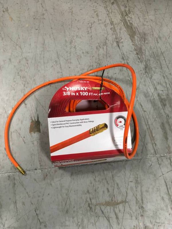 lot 39 image: Husky 38 in. x 100 ft. PVC Air Hose  in good condition