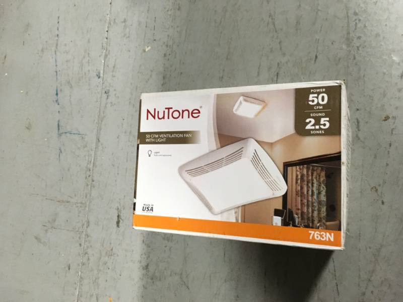 lot 64 image: NuTone 50 CFM Ceiling Bathroom Exhaust Fan with Light  in good condition