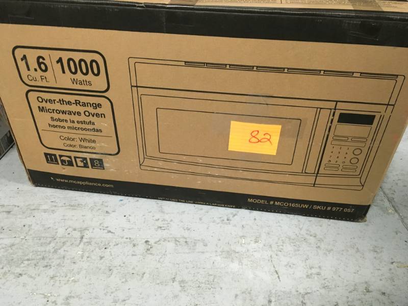 lot 82 image: GE 1.6 cu. ft. Over the Range Microwave in Whitet in good condition