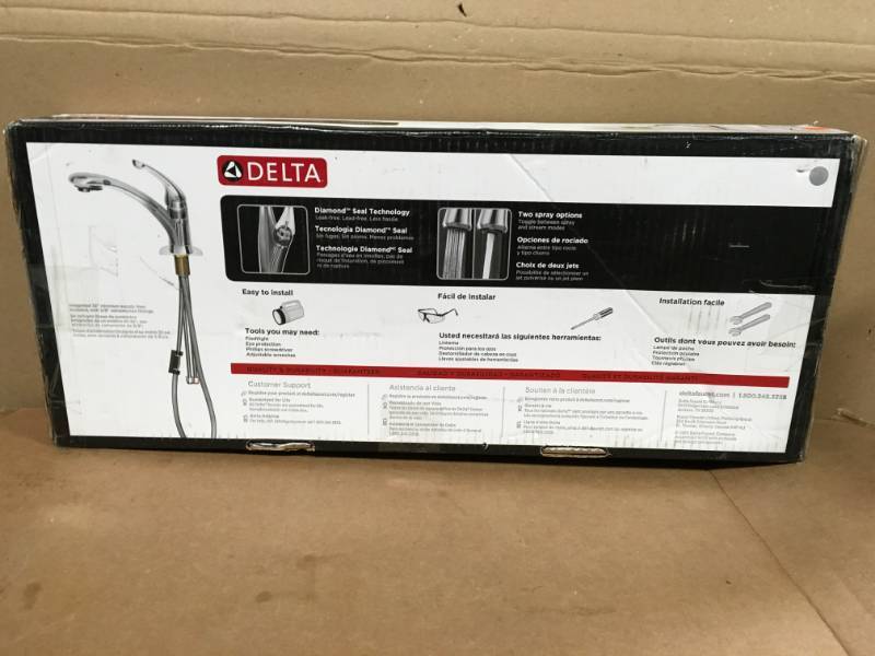lot 75 image: Delta Grant Single-Handle Pull-Out Sprayer Kitchen Faucet In Chrome not used