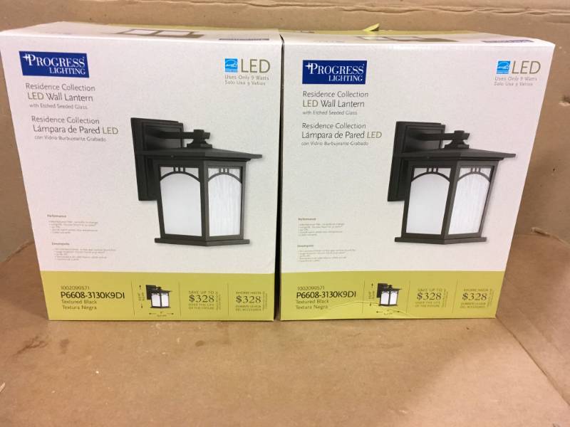 lot 83 image: Progress Lighting Residence Collection 1-Light 12.2 in. Outdoor Textured Black LED Wall Lantern Sconce not used