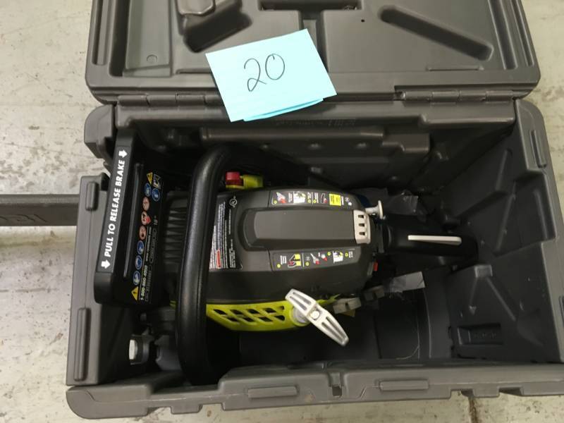 lot 20 image: RYOBI 18 in. 38cc 2-Cycle Gas Chainsaw with Heavy Duty Case blade needs to be replaced