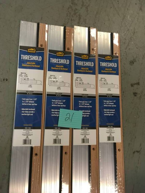 lot 21 image: M-D Building Products 4-916 in. x 36 in. Satin Aluminum and Oak Adjustable Threshold not used