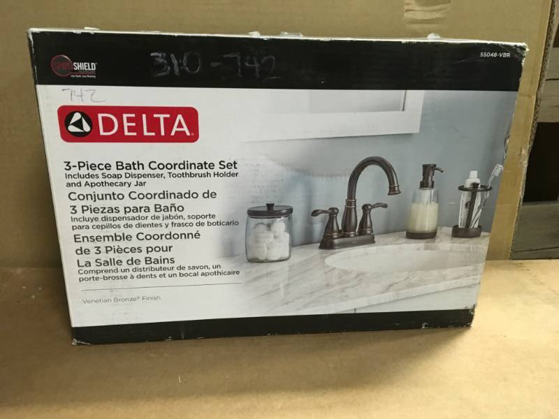 lot 70 image: Delta Bathroom Countertop Accessory Kit with Soap Dispenser Toothbrush Holder Storage Container in Venetian Bronze (3-Piece) not used