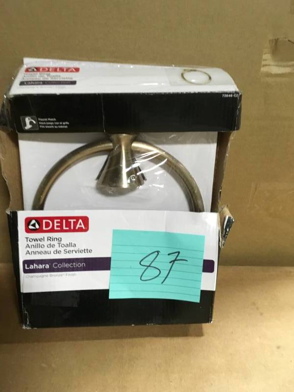 lot 87 image: Lahara Towel Ring in Champagne Bronze not used