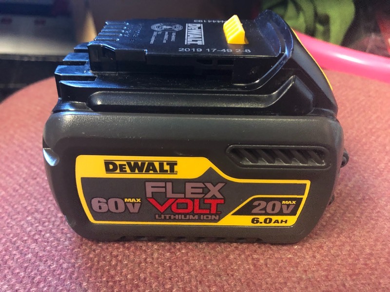lot 106 image: FLEXVOLT 20V 6.0Ah Li-Ion Battery by DeWalt in very good condition