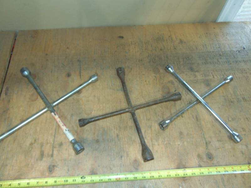 lot 29 image: (3) 4-Way Lug Wrench