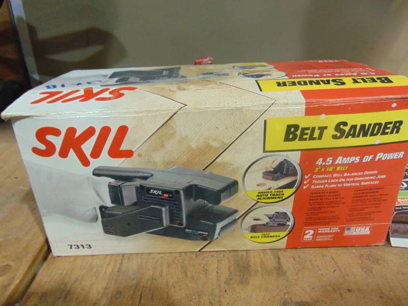 lot 83 image: Belt Sander With Supplies