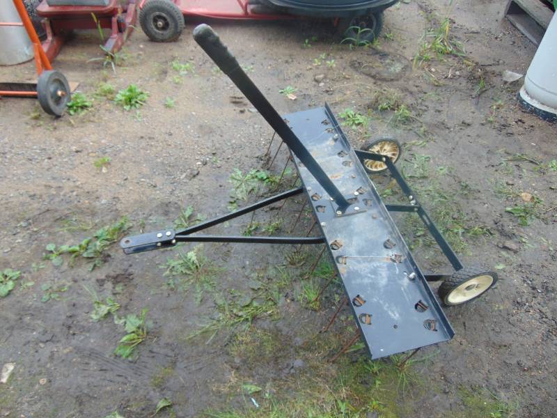 lot 99 image: Agri-Fab Lawn Thatcher