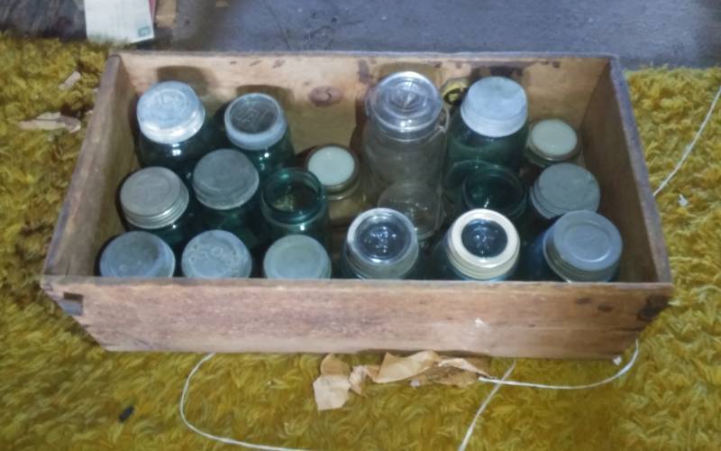 lot 107 image: Old Wood Crate With Blue Mason Jars