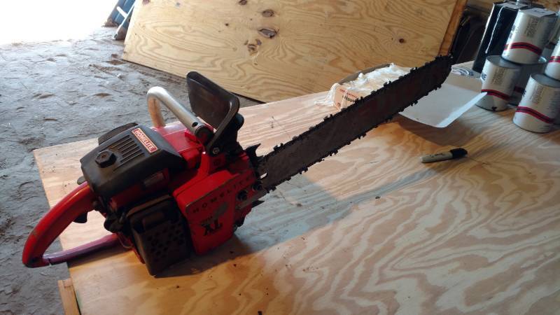lot 35 image: Homelite XL Saw turns over