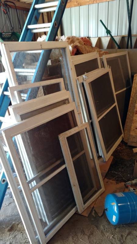 lot 62 image: Old porch screens off of 1950s house