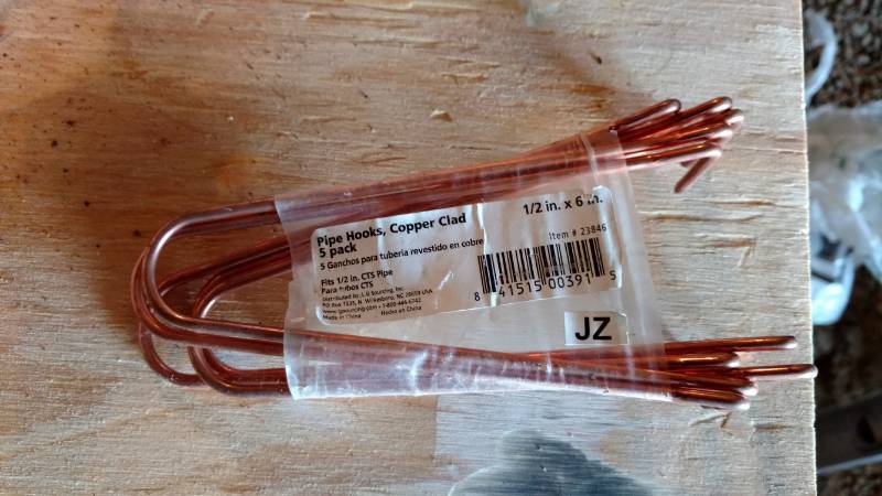 lot 79 image: Large quanity of 12 inch copper clad pipe hooks