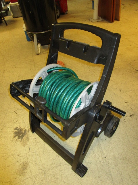 lot 422 image: SUNCREST GARDEN HOSE STAND WITH HOSE