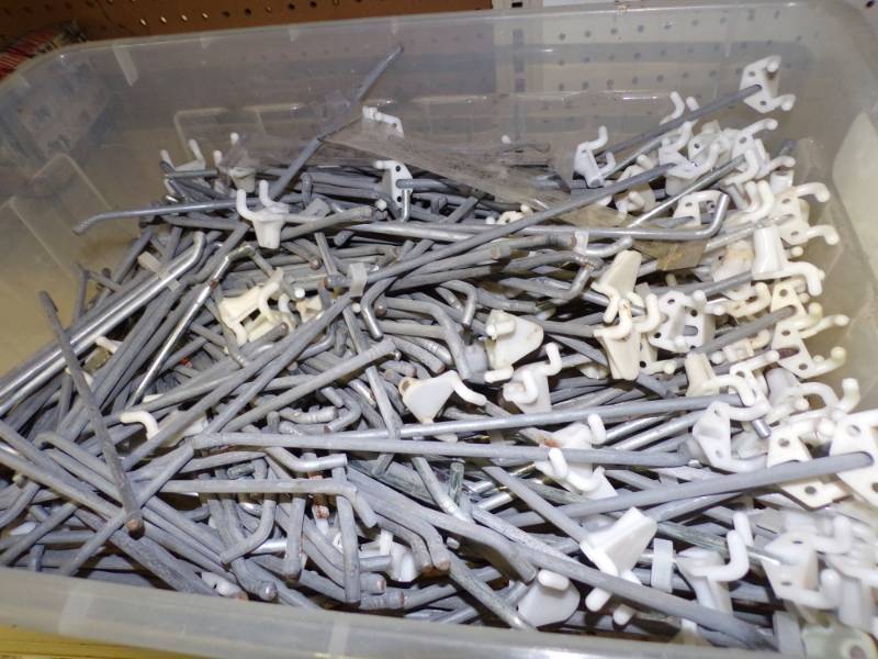 lot 50 image: Tub of Peg Hooks