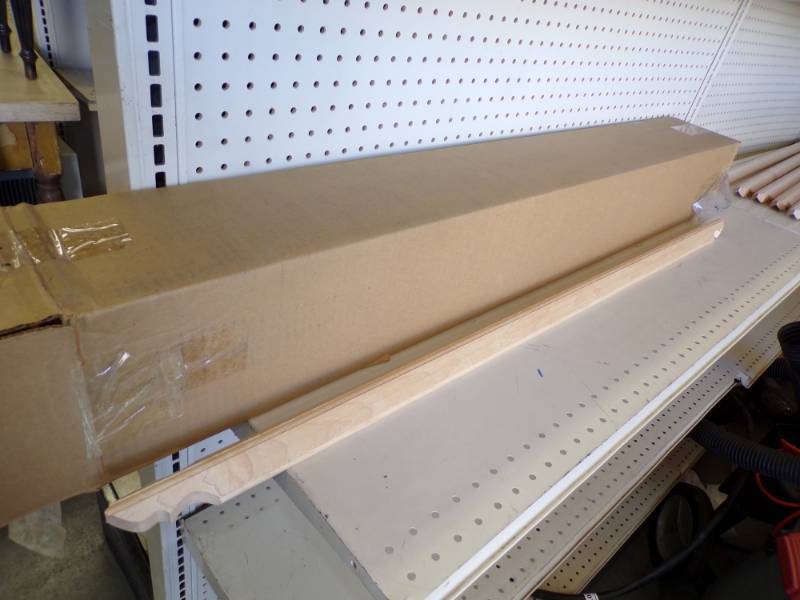 lot 142 image: Case of 25 Maple Corner Molding # 51916