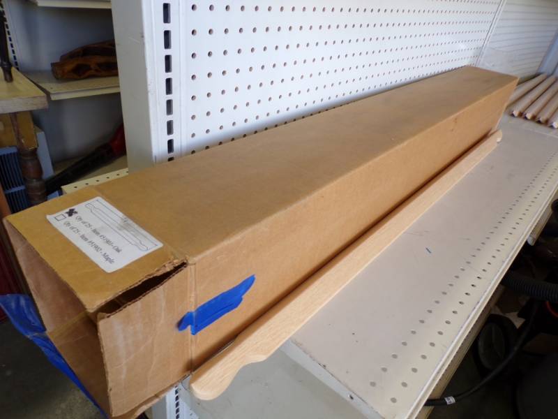lot 145 image: Case of 25 Oak Corner Molding # 51901