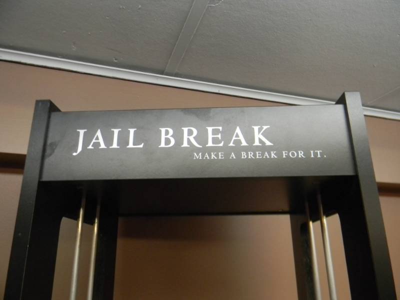 lot 5 image: VINTAGE VERY COOL JAILBREAK MAKE A BREAK FOR IT DISPLAY STAND - VERY COOL PIECE WITH BARS - APPROX 49 BY 17 - SEE PICTURES