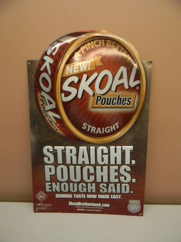 lot 11 image: SKOAL POUCHES ADVERTISING SIGN - APPROX 16 BY 24 - SEE PICTURES