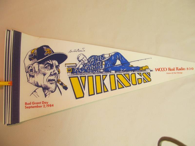 lot 53 image: vintage Bud Grant Viking Pendants