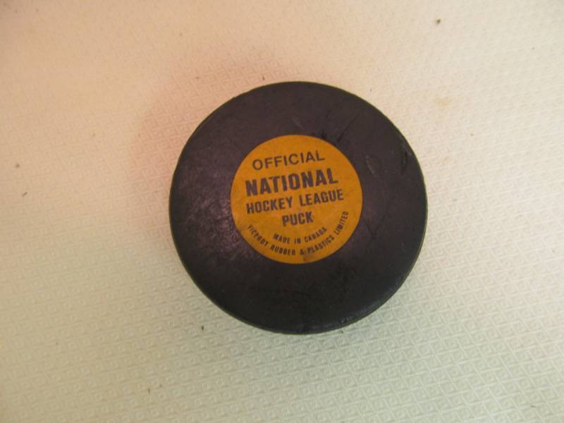 lot 102 image: Official NHL puck