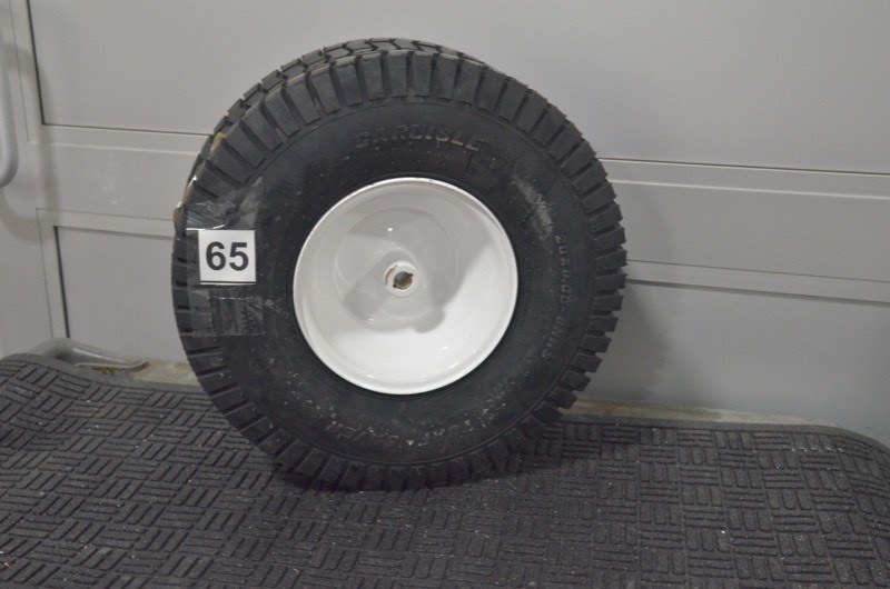 lot 65 image: ARNOLD 20 in. x 8 in. Rear Tractor Wheel