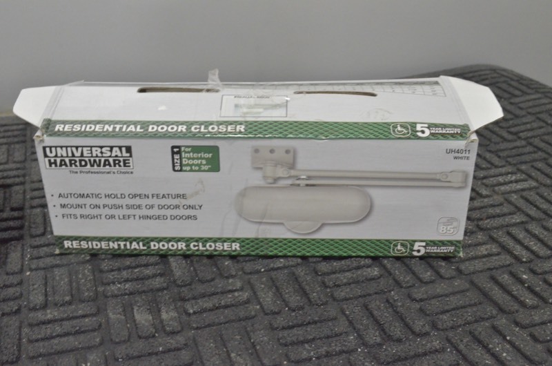 lot 151 image: UNIVERSAL HARDWARE Light-Duty Ivory Aluminum Residential Hold-Open Door Closer- Lot of 2