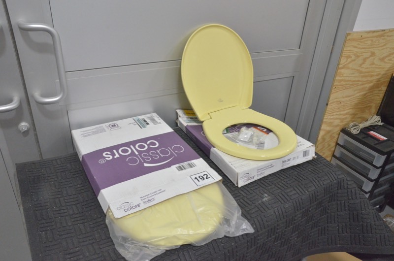 lot 192 image: BEMIS Round Closed Front Toilet Seat in Yellow- Lot of 2