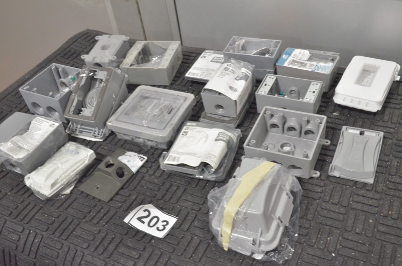 lot 203 image: Huge lot of Electrical Outdoor gang boxes, receptacle covers, weatherproof covers, MORE