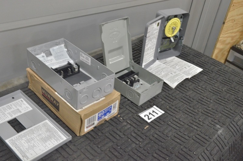 lot 211 image: Lot including MURRAY 60 Amp 2-Space 4-Circuit Surface Mount Main Lug Load Center and similar circut boxes