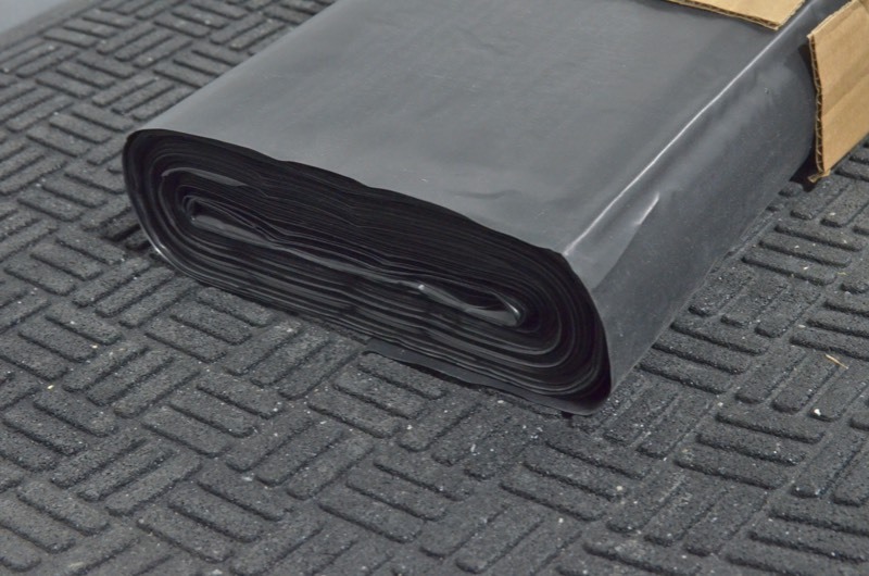 lot 221 image: 20 in. Black plastic sheet