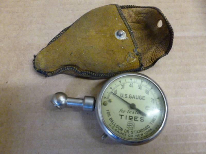 lot 33 image: Antique Tire Pressure Gauge