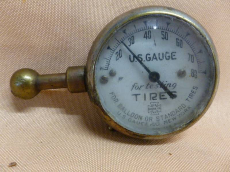 lot 34 image: Antique Tire Pressure Gauge